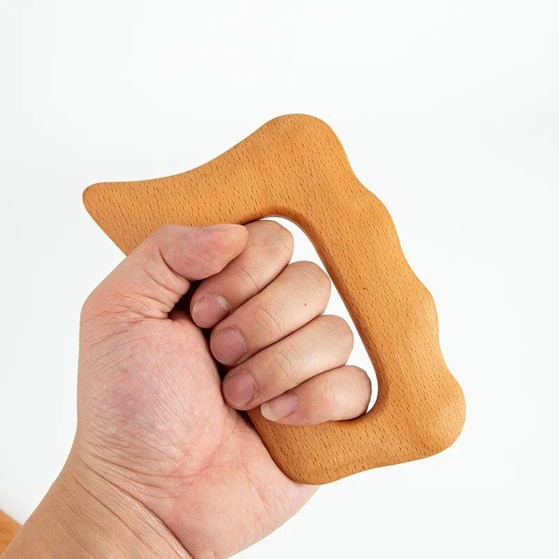 natural wood gua sha massage board for lymphatic drainage and cellulite reduction