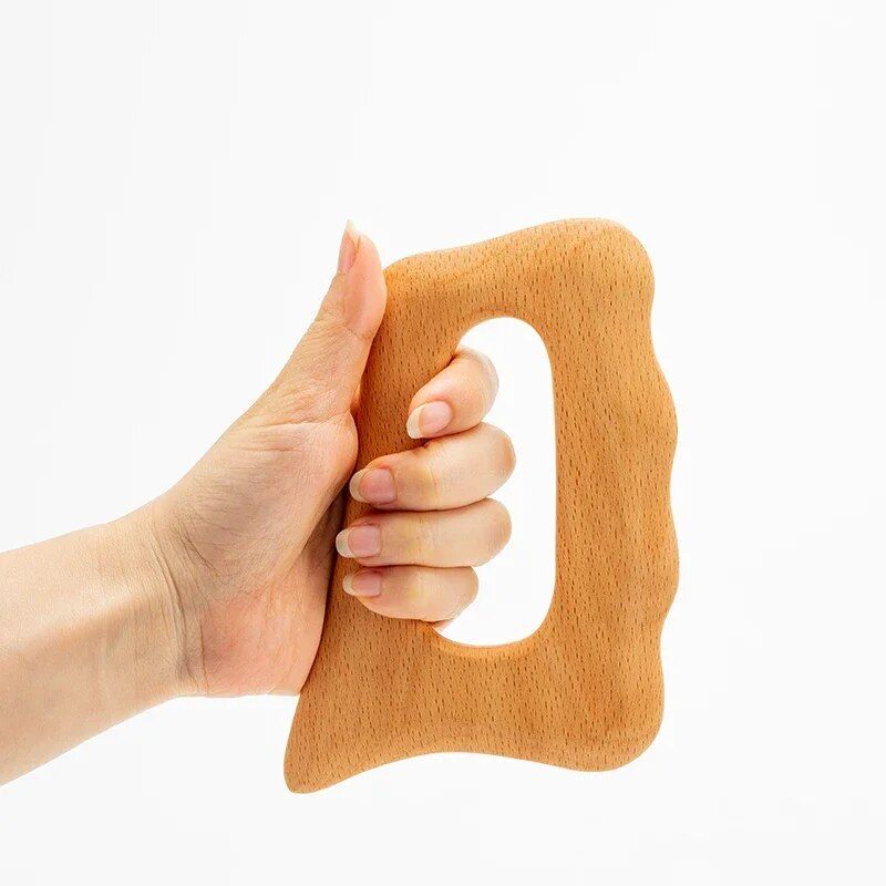 natural wood gua sha massage board for lymphatic drainage and cellulite reduction