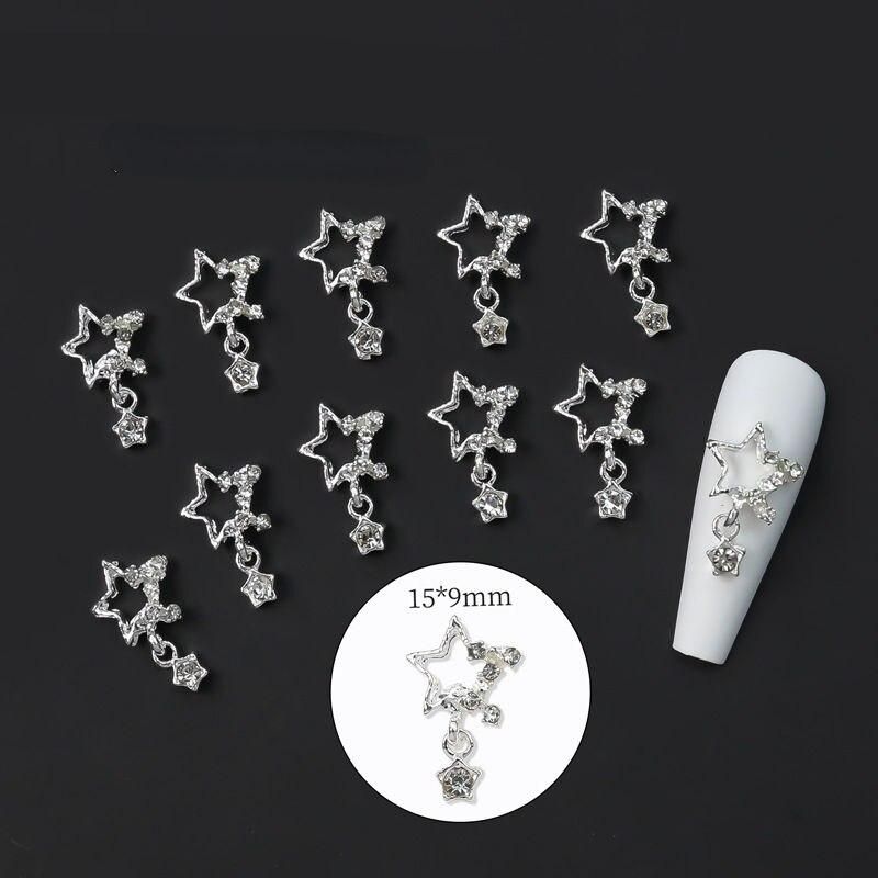 galactic charms: 3d nail art rhinestones in celestial designs